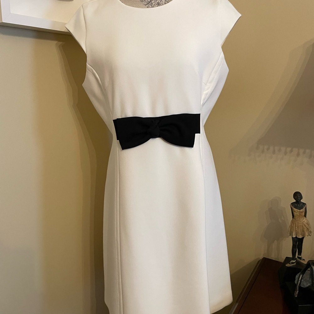 Elegant White Dress with Black Bow